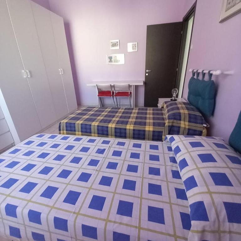 Affittacamere Appartamento colorato - Camera Queen con Bagno in Comune - 28