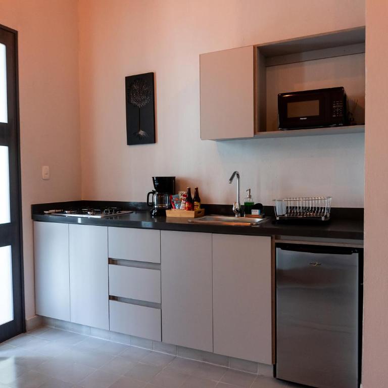 The Garden Suites - Apartamento Deluxe - 8