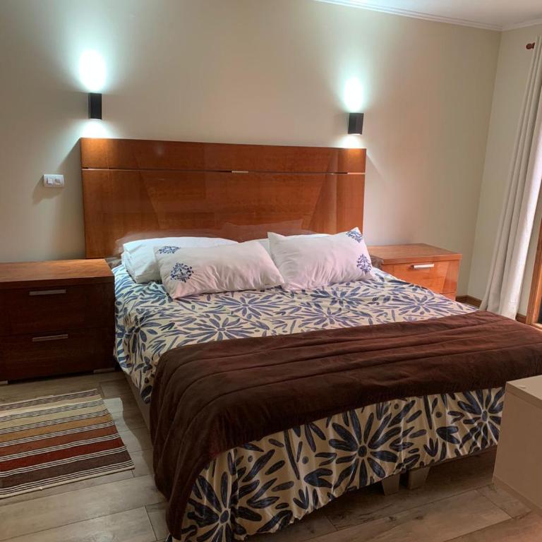 Hotel Boutique Family Suites - Habitación con cama grande y vistas al jardín - 13