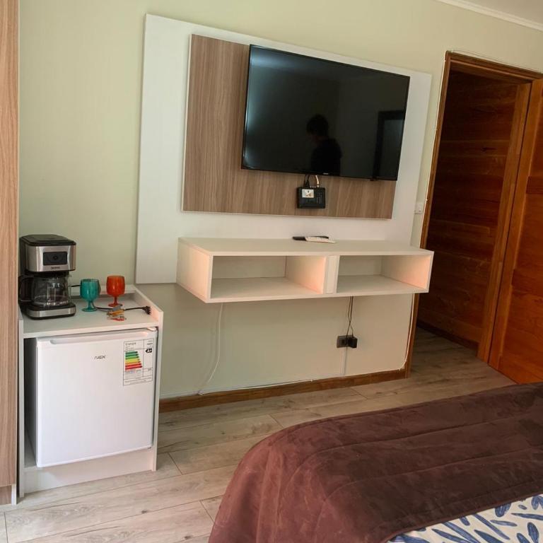 Hotel Boutique Family Suites - Habitación con cama grande y vistas al jardín - 10