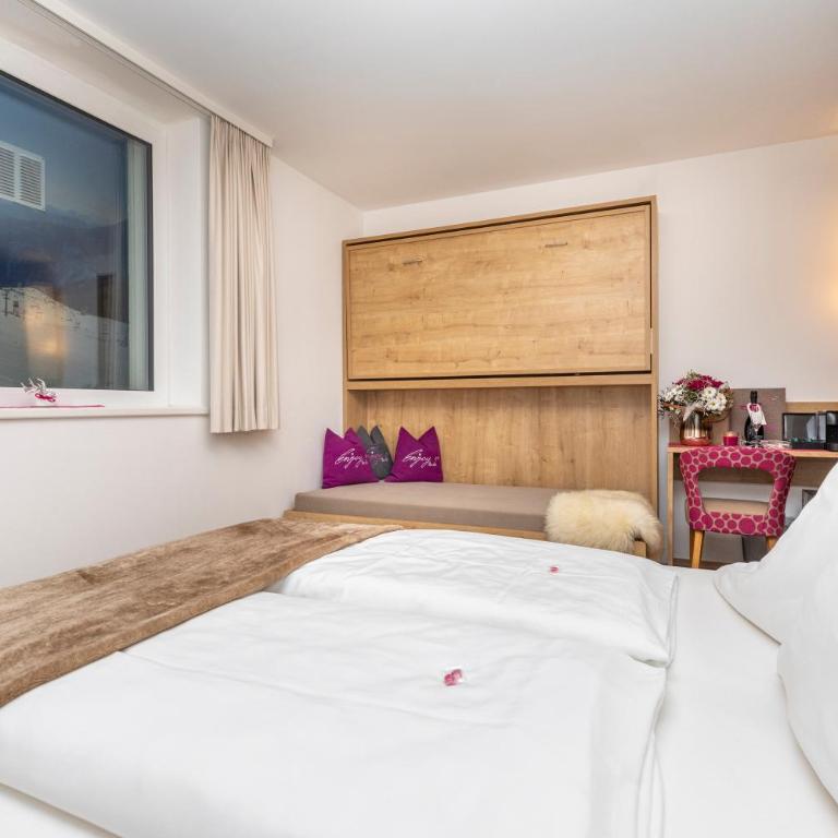 Enjoy The Alps - Aparthotel - Zimmer im Untergeschoss - 22