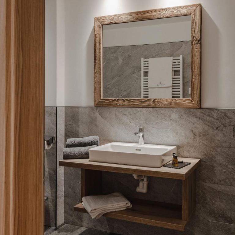Lieblingsplatzl inklusive kostenfreiem Eintritt in die Alpentherme ganzjährig - im Sommer freie Bergbahnfahrten - Apartment - Erdgeschoss - 1