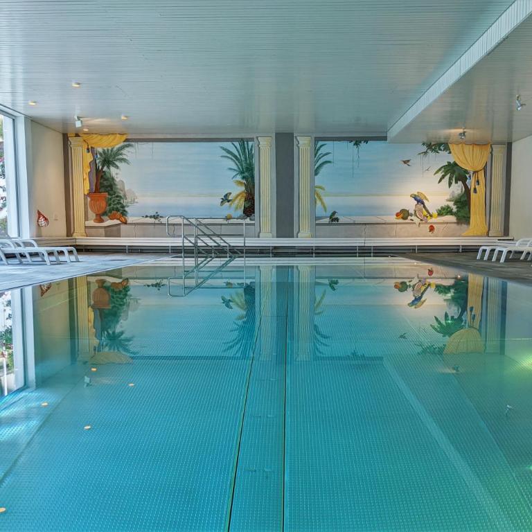 Modern renoviert mit Hallenbad + Fitness - Studio-Apartment - 25