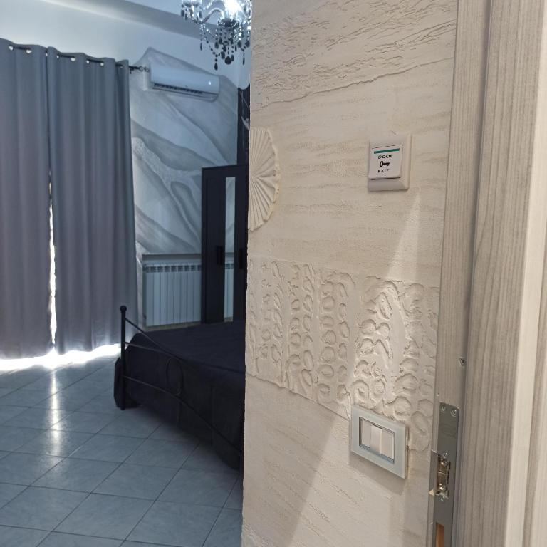 In The Center Rooms - Camera Tripla con Balcone - 21