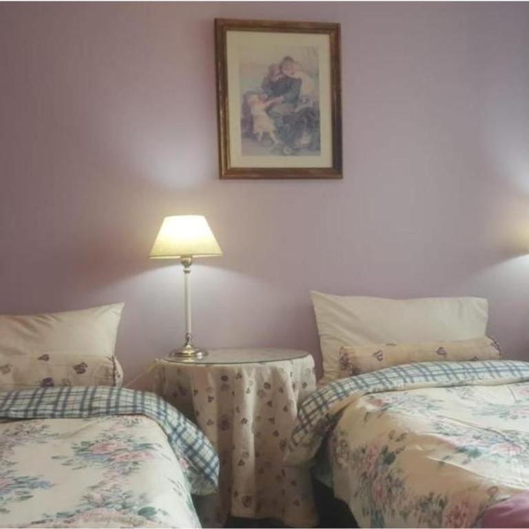 FLOR AUSTRAL - Habitación Doble con baño privado - 2 camas - 1