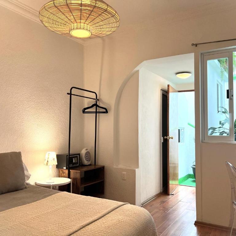 Distrito Condesa Rooms and Studios - Habitación Estándar - 1 cama grande - 4