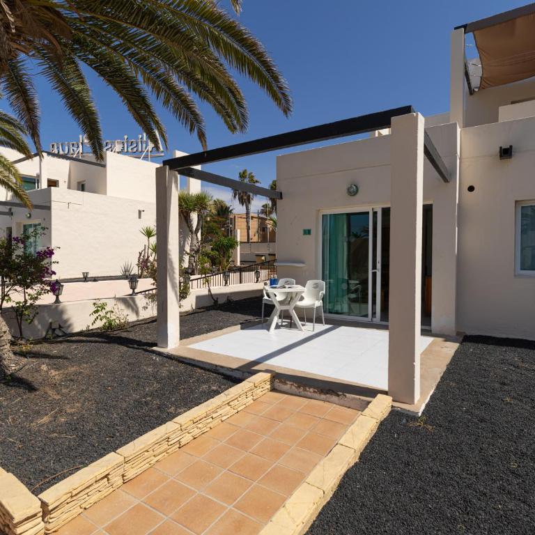 HomeForGuest Apartamento Alisios 1 con piscina en Corralejo - Apartamento - 6