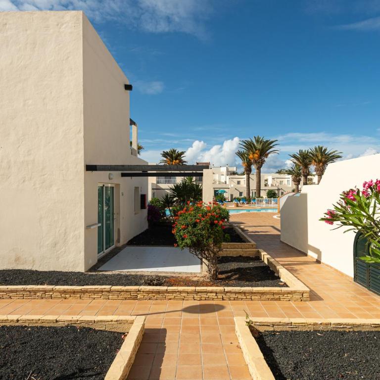 HomeForGuest Apartamento Alisios 1 con piscina en Corralejo - Apartamento - 24