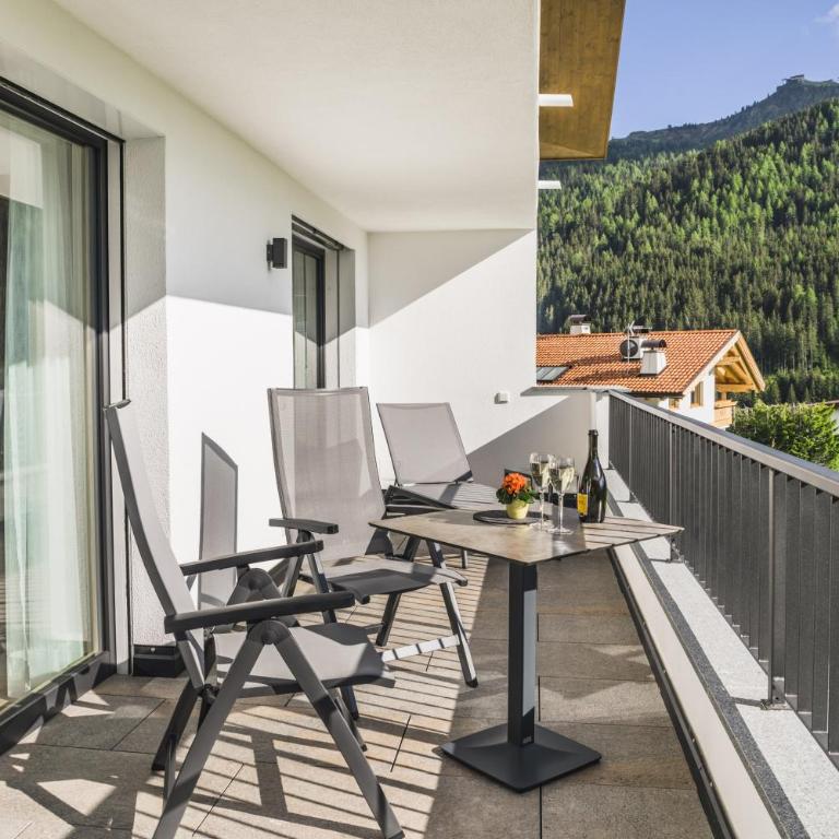 Aurela Mountain Chalets - Apartment mit Terrasse - 9