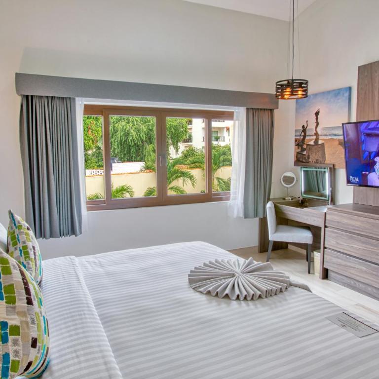 Casa Nicole Boutique Hotel - Habitación con cama extragrande y vistas al jardín - 1