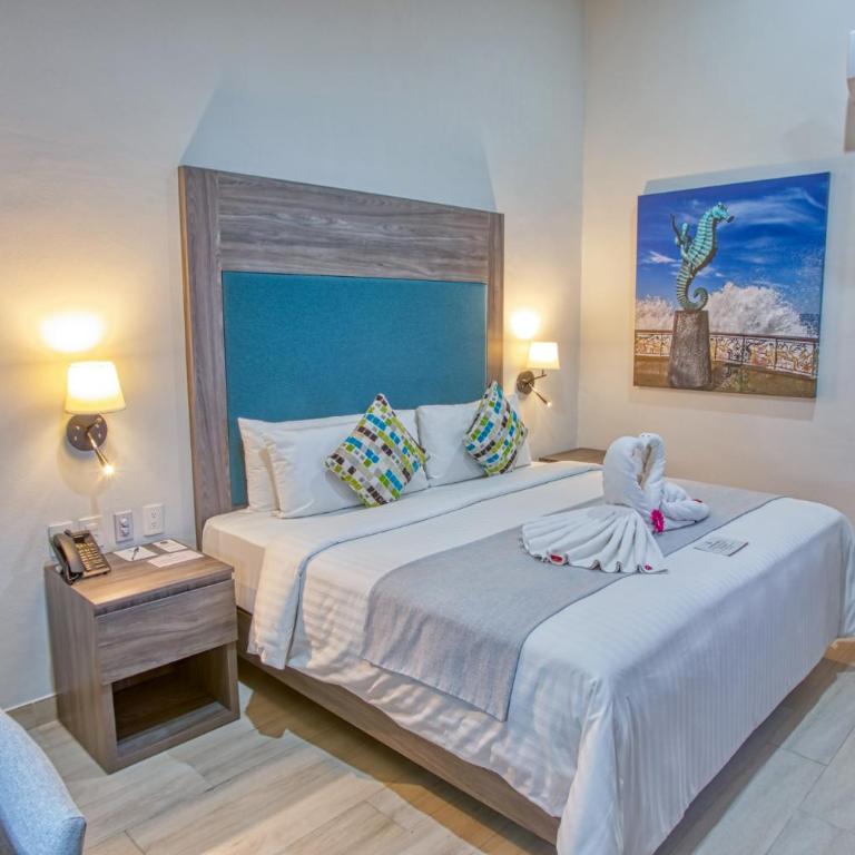 Casa Nicole Boutique Hotel - Habitación con cama extragrande y vistas al jardín - 7