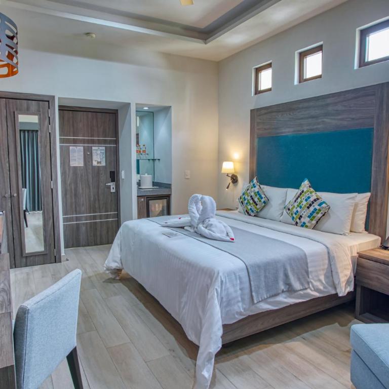 Casa Nicole Boutique Hotel - Habitación con cama extragrande y bañera de hidromasaje - 1