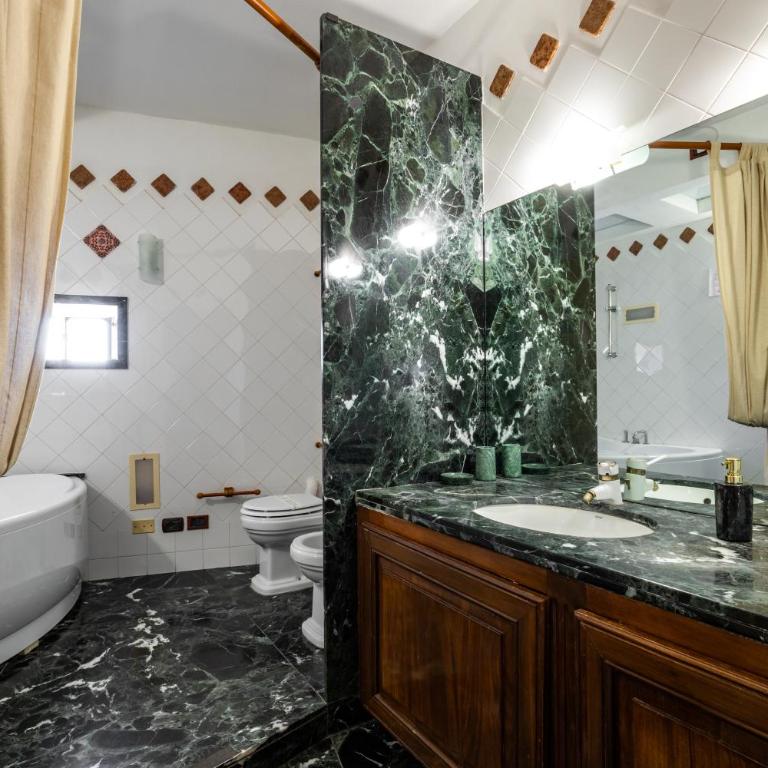 Residenza Kastrum - Suite Deluxe con Vasca Idromassaggio - 9
