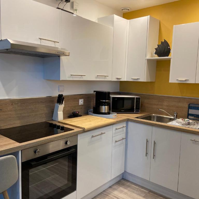 "Appartement sur digue" proche de la plage avec wifi - Apartment - 10