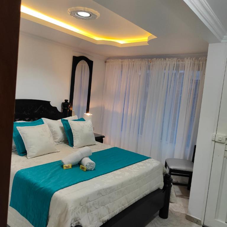 Hospedaje El Buen Descanso - Habitación Doble Deluxe (2 adultos + 1 niño) - 4