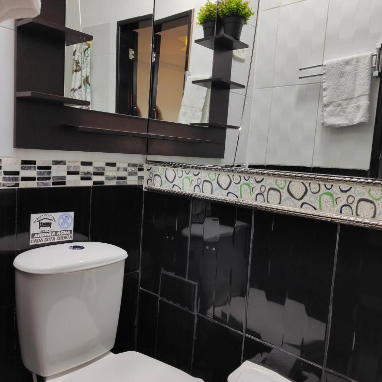 Hospedaje El Buen Descanso - Habitación Doble Deluxe (2 adultos + 1 niño) - 7