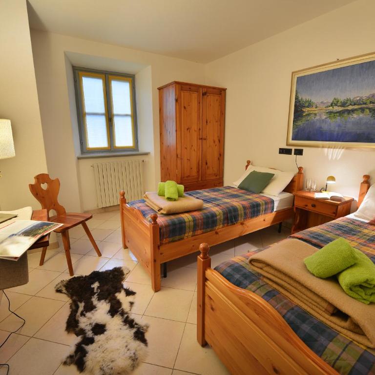 Albergo Casa Alpina San Luigi - Camera Budget Doppia con Letti Singoli - 1