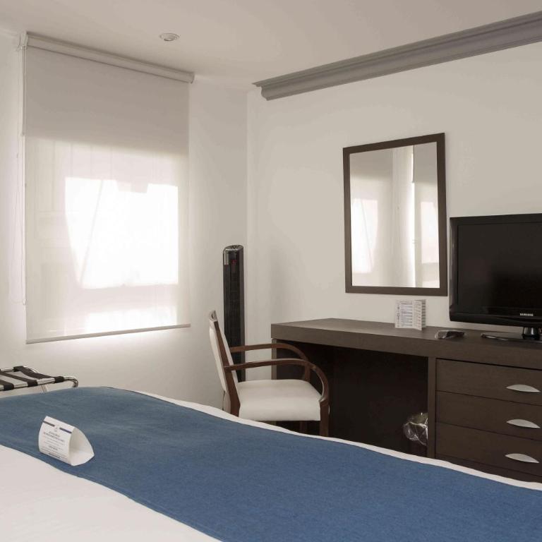 Suites Obelisk - Habitación Estándar - Cama extragrande - 4