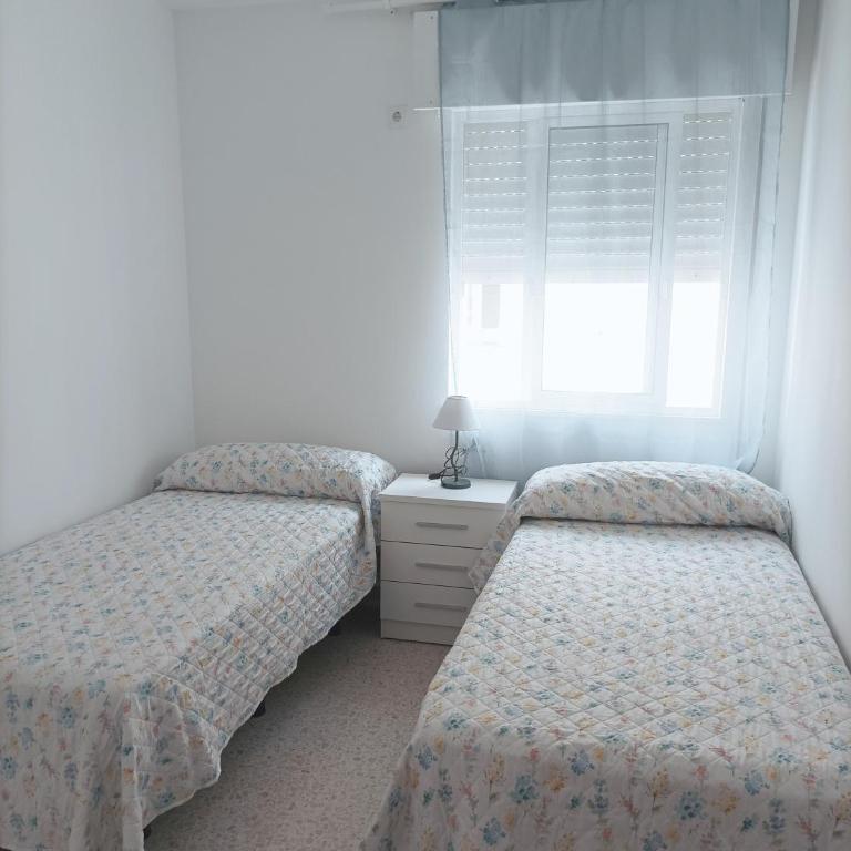 Duplex céntrico con piscina a 100m de la playa. - Apartamento - 7