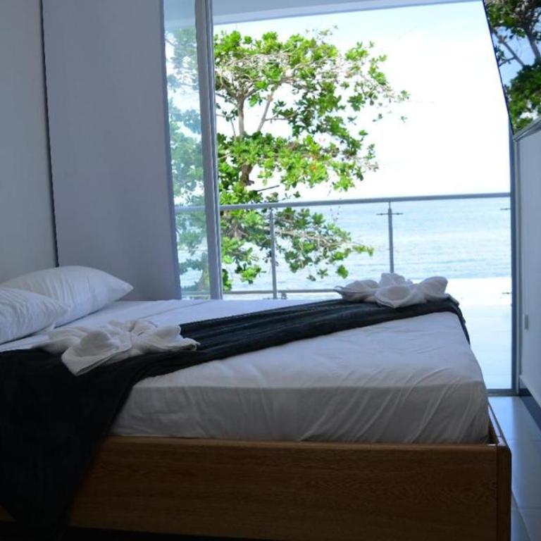 Alpha Hotel Boutique - Habitación Doble Deluxe con balcón y vistas al mar - 3