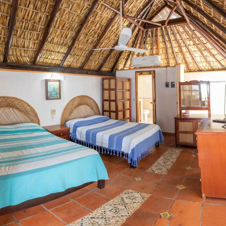 Hotel y Bungalows Acuario - Habitación Deluxe con 2 camas grandes - 4