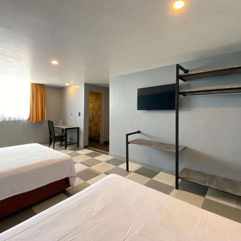 Hotel Estrella de Oriente - Habitación Doble Estándar con 2 camas dobles - 1