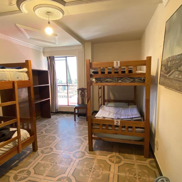 The Rooftop Bolivia - Cama en habitación compartida con 4 camas - 4