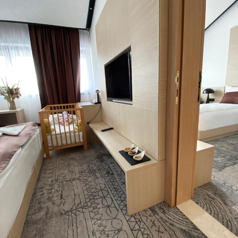 Hotel Boss - Deluks Četvorokrevetna Soba - 5