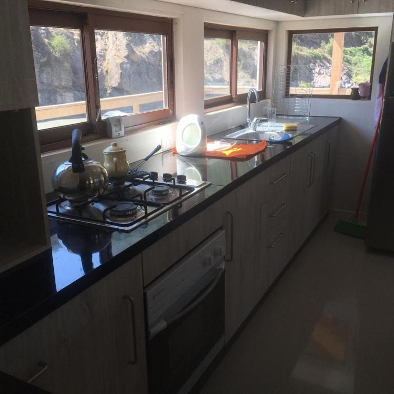 Los Quenes River Lodge - Deluxe Family Suite - 9