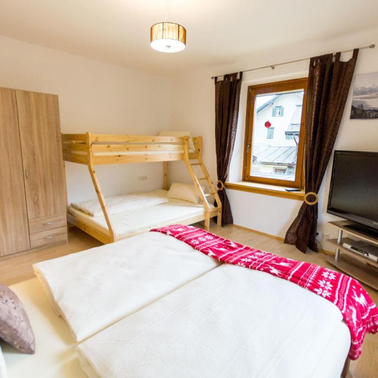 Ski-n-Lake City Apartments - Apartment mit 2 Schlafzimmern und Gartenblick - 2