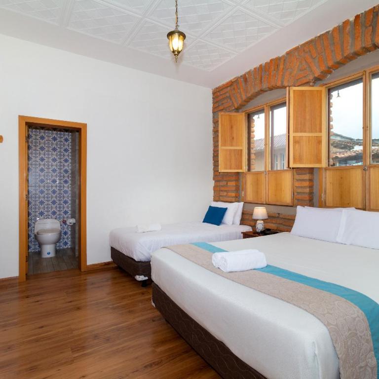 San Rocke House Hotel - Habitación Triple con vistas a la ciudad - 3