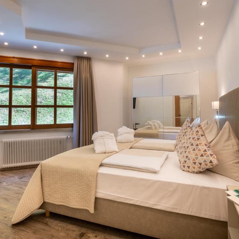 Hotelresort Klopeinersee - Suite mit Queensize-Bett und Whirlpool - 6