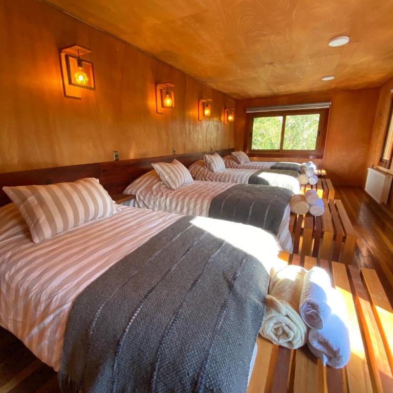 Illi Lodge & Hostel - Quadruple Room with Private Bathroom - 1