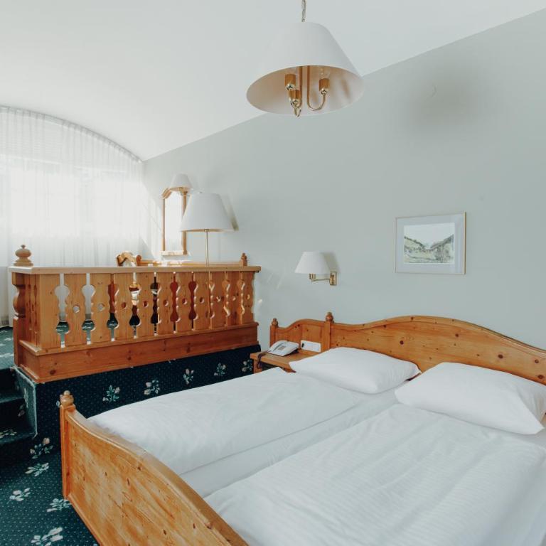 Langwies Genussherberge - Dreibettzimmer - 1