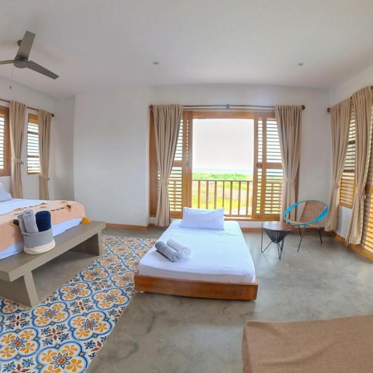 Casa Mambo Salinas - Habitación Doble Deluxe con vistas al mar - 2 camas - 1