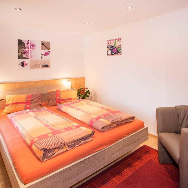 Ferienwohnung Schmid - Apartment mit 2 Schlafzimmern und Gartenblick - 8