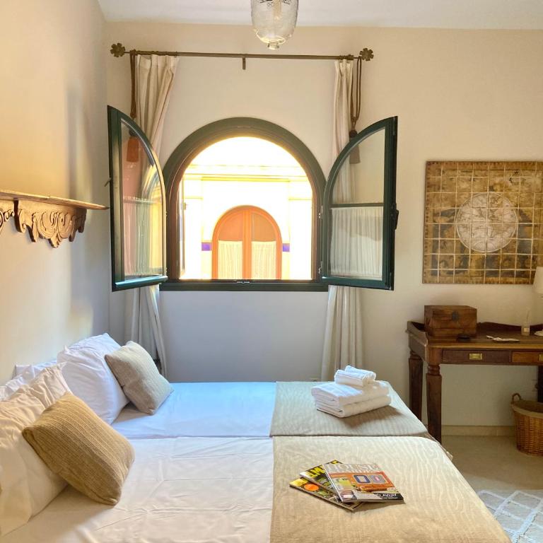 CASA PALACIO SXVIII CON PISCINA en centro histórico de SEVILLA - Villa - 60