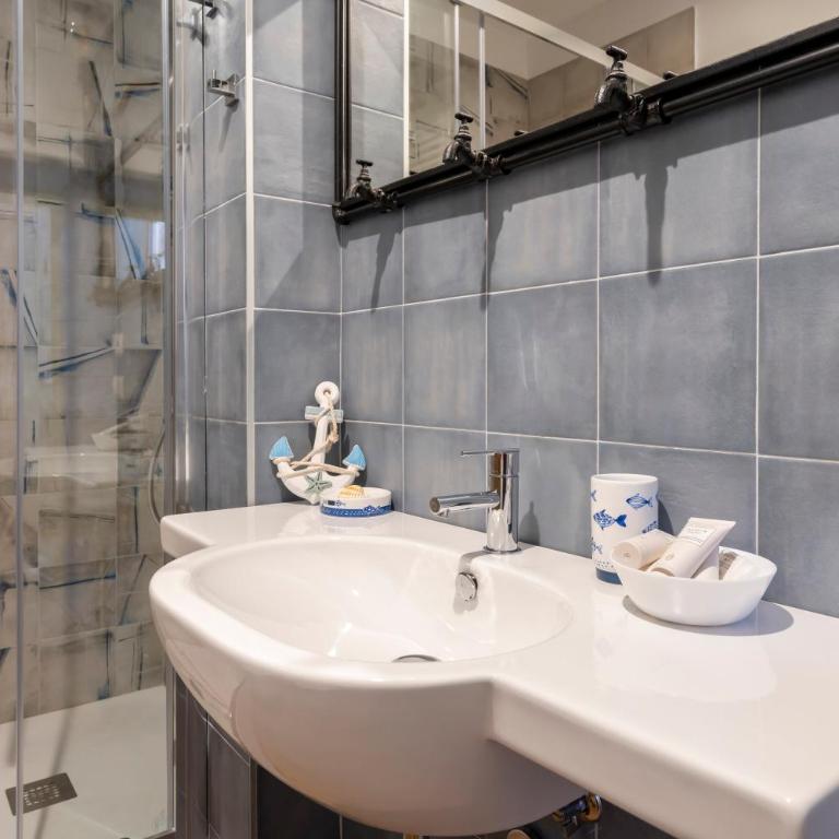 GuestHost - La Dimora di Miriam Netflix Flat - One-Bedroom Apartment - 15