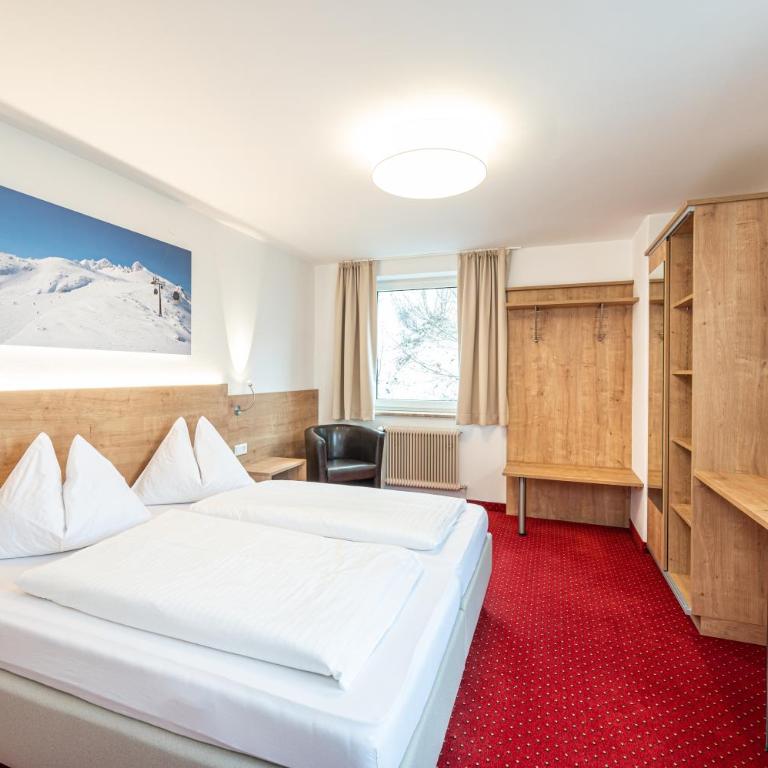 Hotel Appartement Winter - Doppelzimmer mit Blick auf die Skipiste - 1