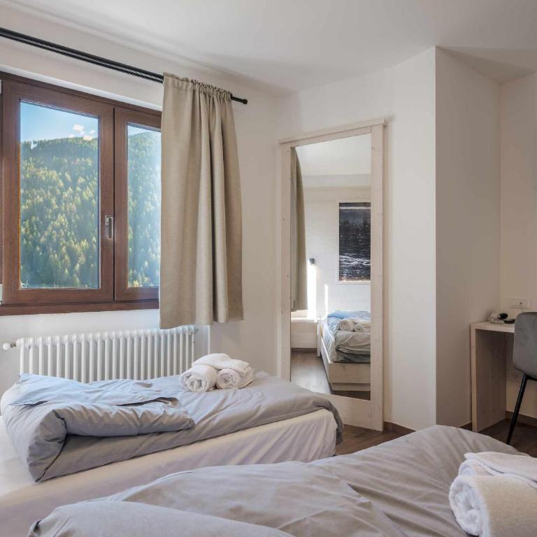 Hotel Garnì Alta Valle - Camera Doppia con Letti Singoli - 8