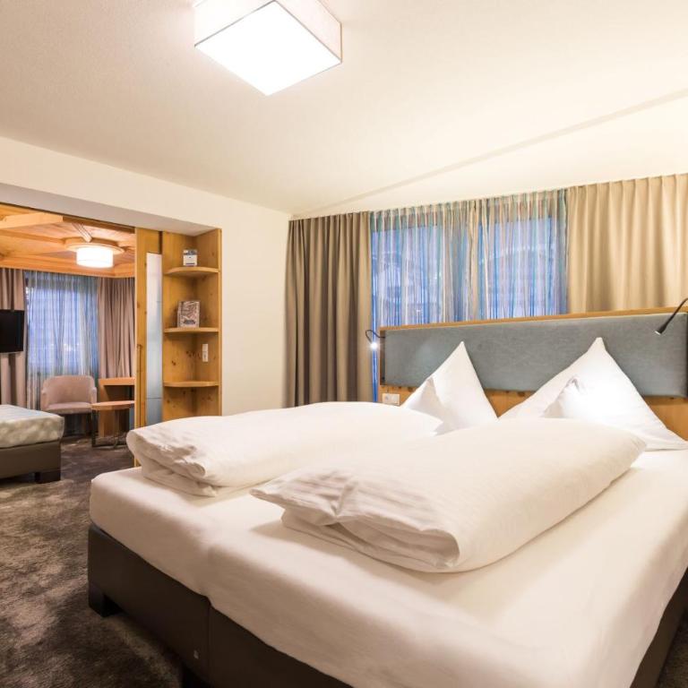 Hotel Piz Buin - Deluxe Vierbettzimmer - 4