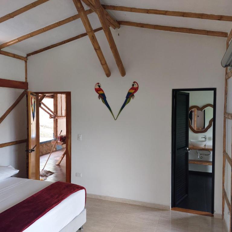 Las cabañas del escobo-CABAÑA GUACAMAYAS - Quadruple Room with Mountain View - 12