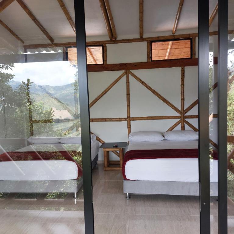 Las cabañas del escobo-CABAÑA GUACAMAYAS - Quadruple Room with Mountain View - 3