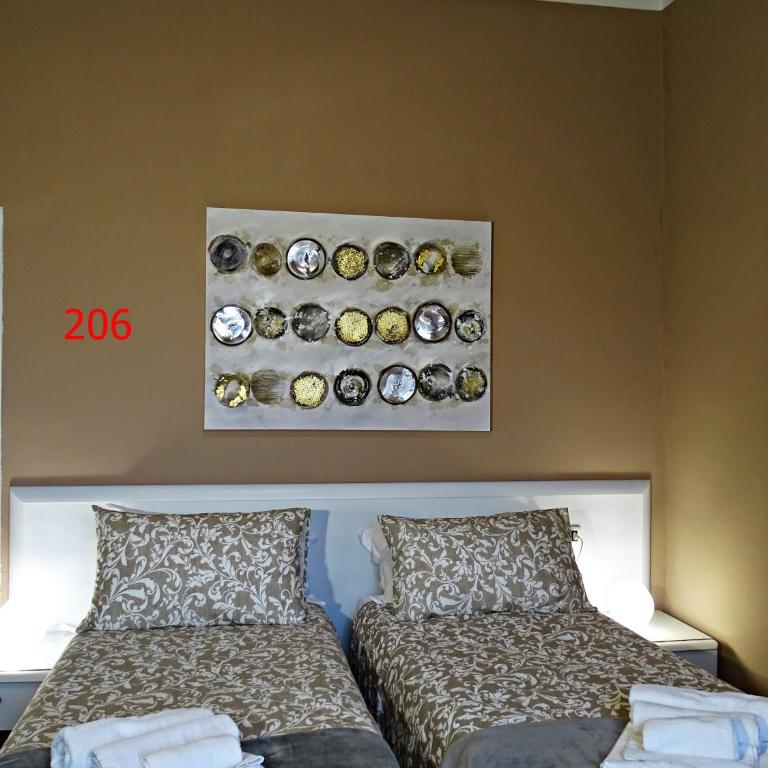 Affittacamere Arancio - Camera Matrimoniale con Letto Supplementare - 1