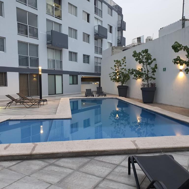Departamento nuevo y céntrico con ambiente familiar en Guadalajara - Two-Bedroom Apartment - 23