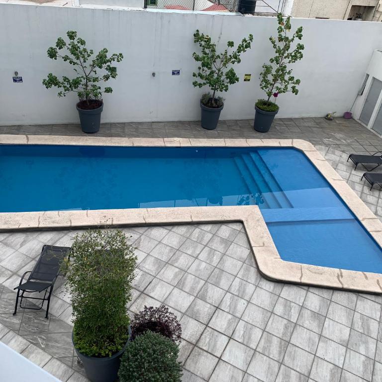 Departamento nuevo y céntrico con ambiente familiar en Guadalajara - Two-Bedroom Apartment - 24