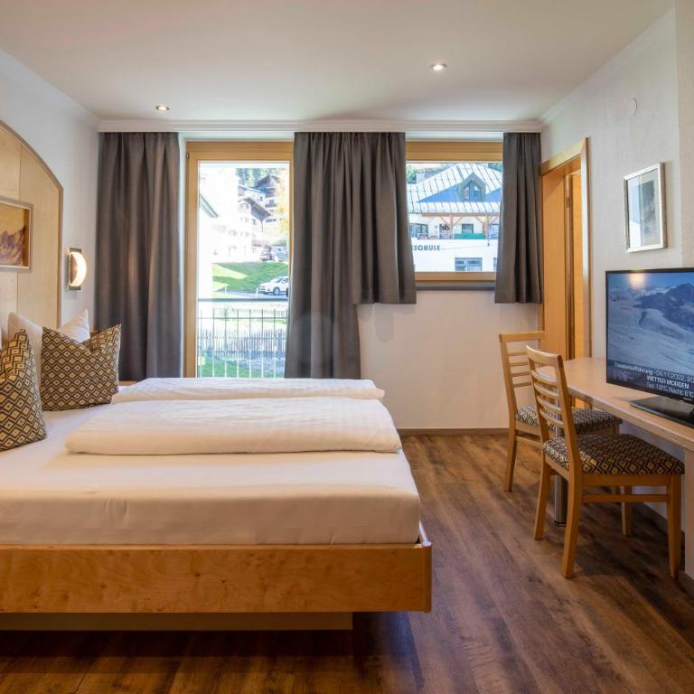 Kirchwirt Appartements - Comfort Apartment mit 3 Schlafzimmern und Balkon - 1