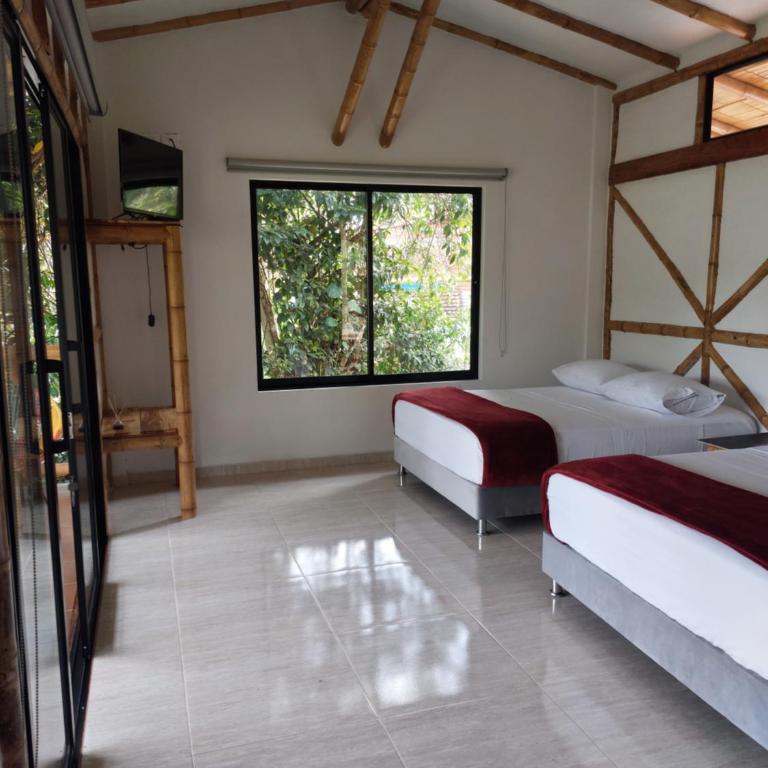Las cabañas del escobo-CABAÑA GUACAMAYAS - Quadruple Room with Mountain View - 18