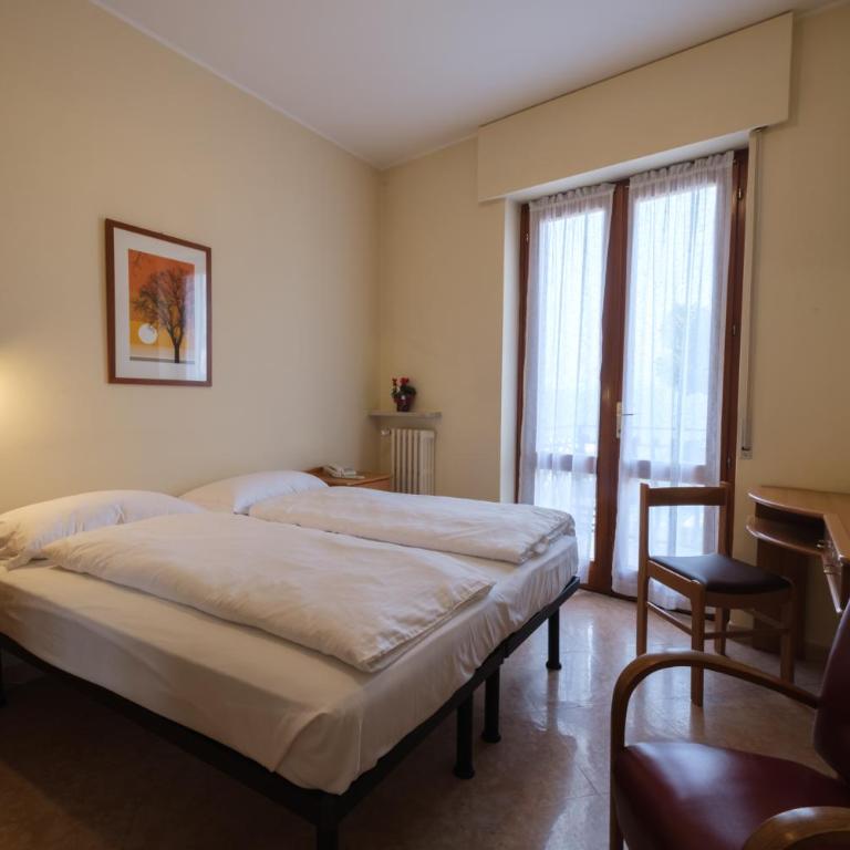 Casa Vacanza - Casa del Padre Nascimbeni - Camera Matrimoniale/Doppia con Letti Singoli con Vista - 1