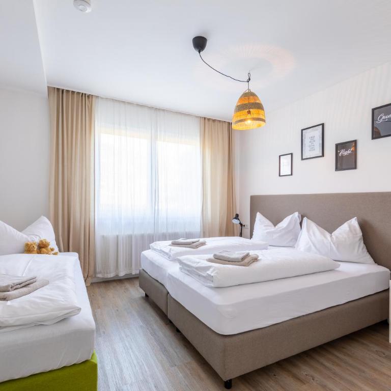 Appartements DAS RETTENBACHER - Apartment mit 2 Schlafzimmern mit Garten und Bergblick - 17